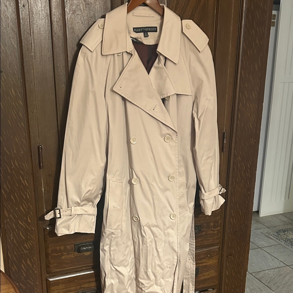 Women’s Rain/Trench coat with a zip in/out liner.